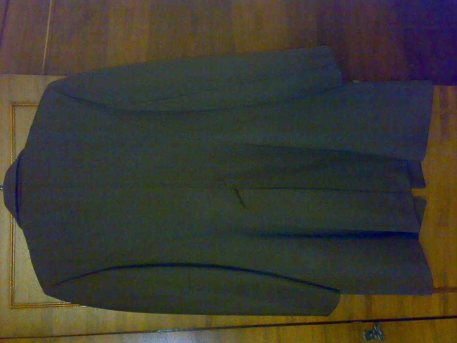 Женский вязанный комплект( жилет и юбка) с орнаментом