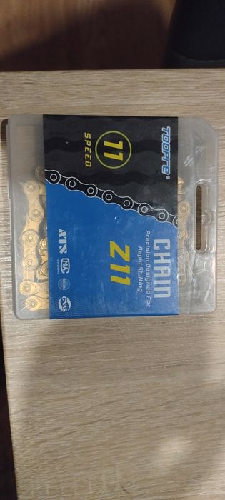 Łańcuch rowerowy 11 rzędowy zloty