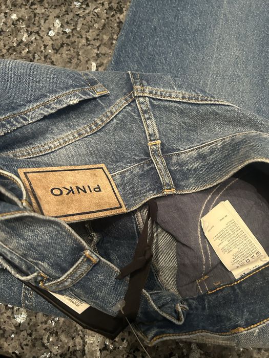 Spodnie jeans z przetarciami Pinko r.28
