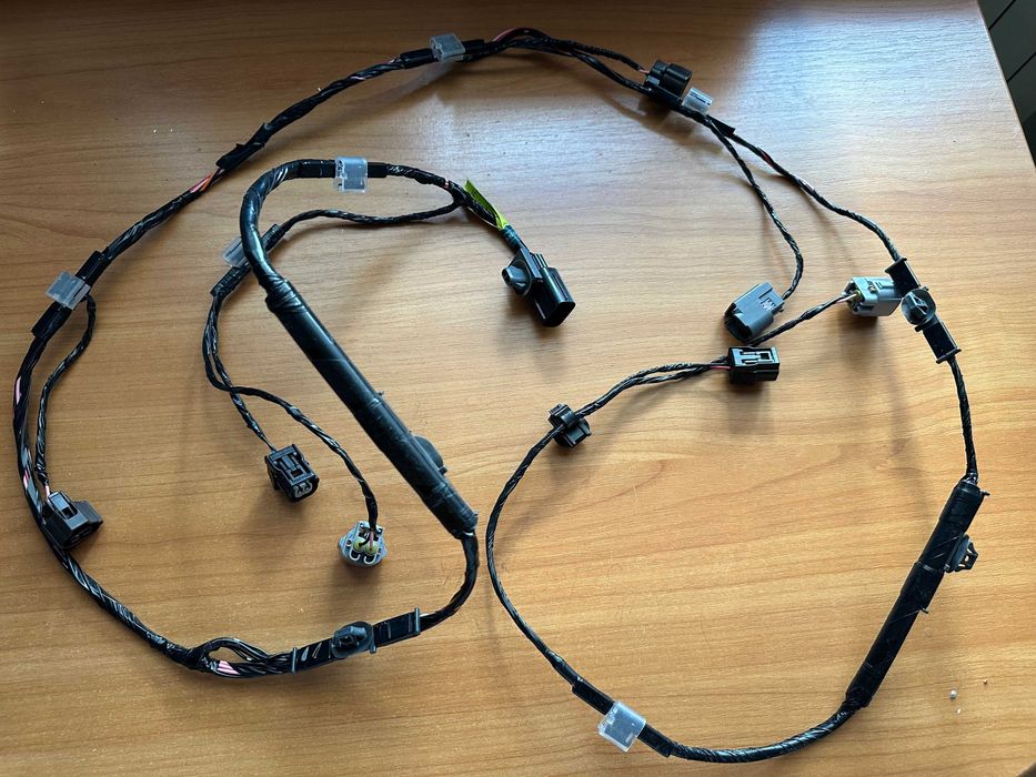 Проводка заднього бамперу Mazda NA1J-67-290A нова, оригінальна.