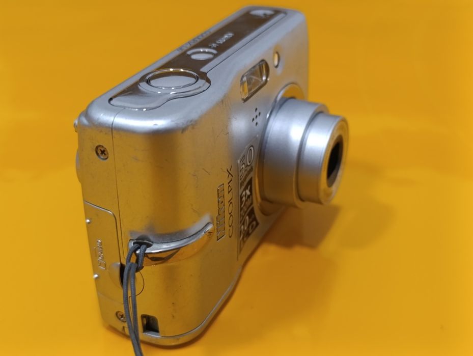 Aparat cyfrowy kompaktowy Nikon Coolpix  L10, na baterie AA, 99% OK