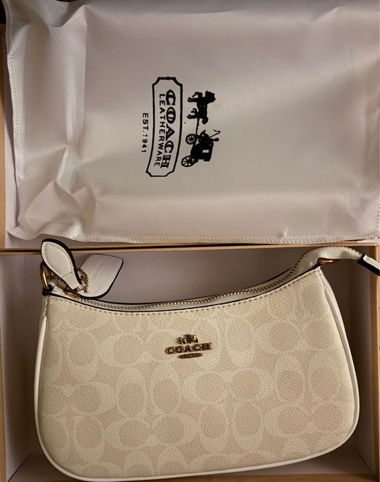 Mala Coach com caixa original