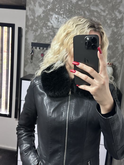 Кожана куртка на хутрі