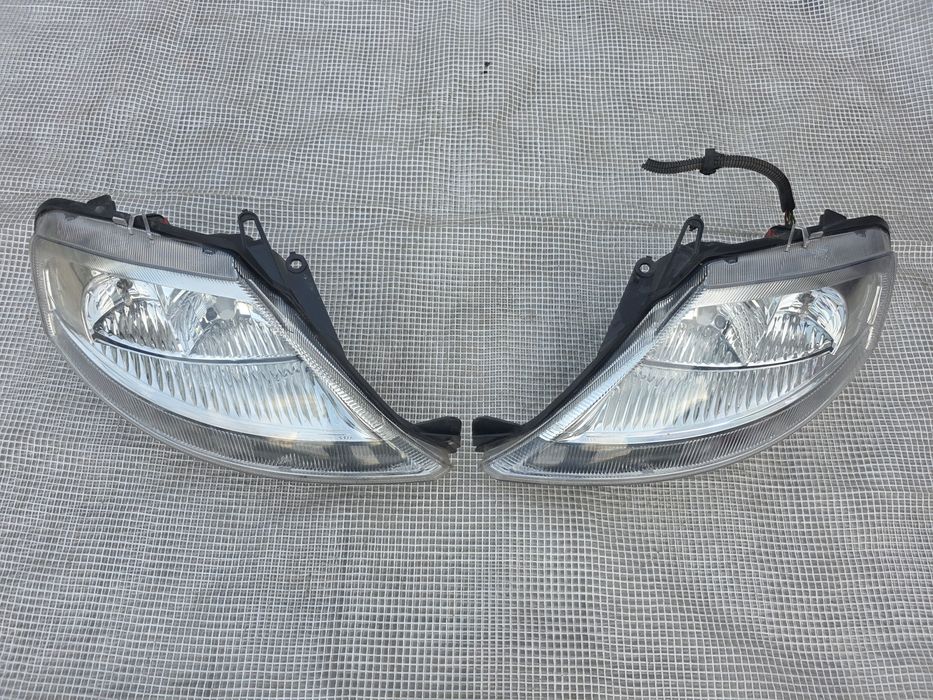 Citroen C3 2002-2009 rok lampa reflektor prawa lewa przód wersja europejska Tyc komplet