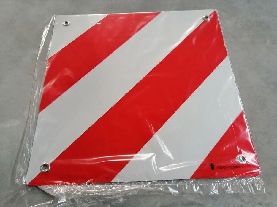 Placa refletora P2 de carga que excede comprimento