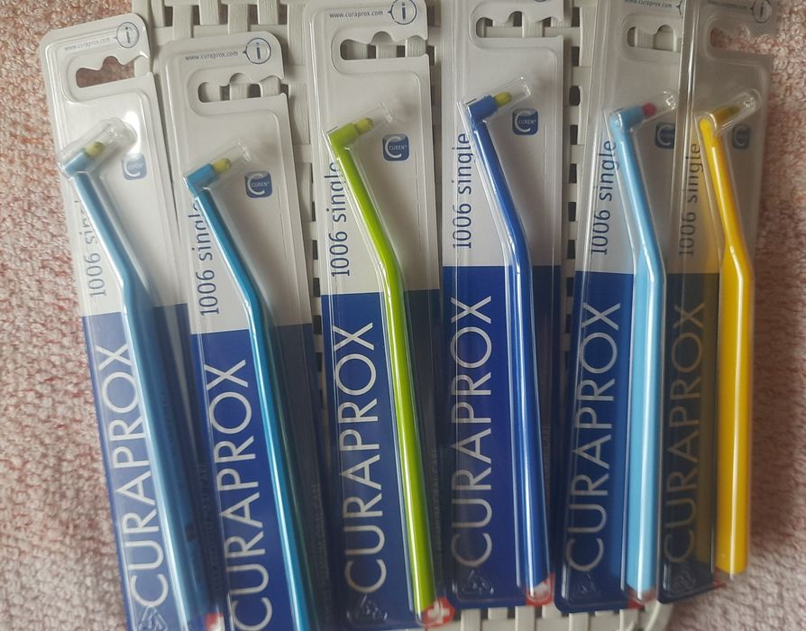 Монопучкова зубна щітка Curaprox 1006 та 1009