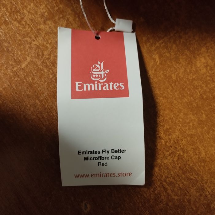 Кепки Puma і Emirates