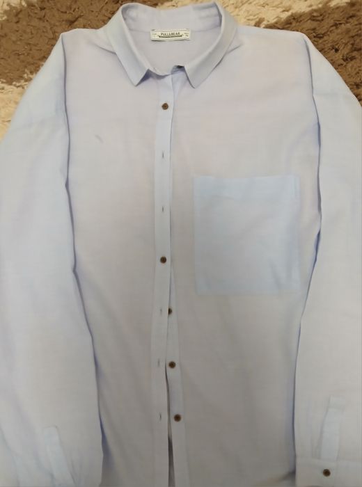 Несколько мужских рубашек, разных цветов и качества