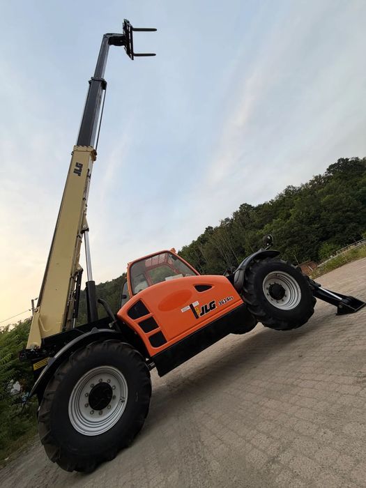 JLG 3614RS CAT Ładowarka Teleskopowa Dźwig Zwyżka 14 metrów wysuw. Udźwig 4 tony. Widły. Silnik DEUTZ TuRBO. 110KM. Maszyna jak Nowa z Norwegii Pracowała w Urzędzie Komunalnym.  DEKRA BMWT. skręt 3 tryby 4 koła KRAB. Auto-poziomowanie!  Zero luzów wyciekó
