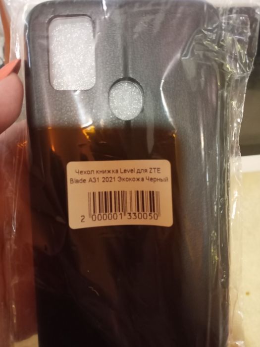 Продам чехол книжка на телефон ZTE A31