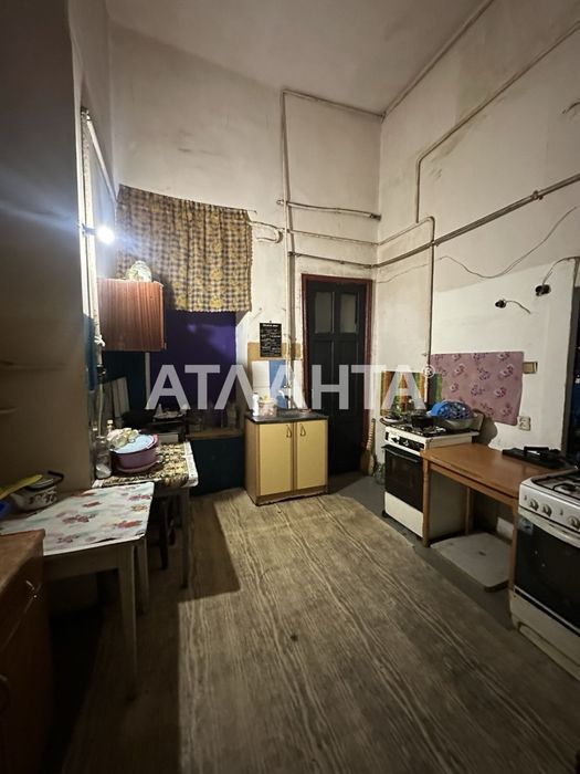 Продам двухуровневую комнату  в центре