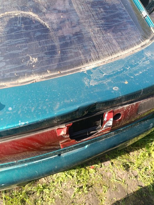 Задній бампер Mazda 323 BA