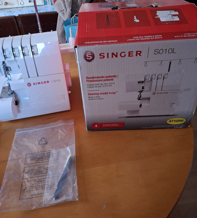 Venda de máquina corte e cose Singer