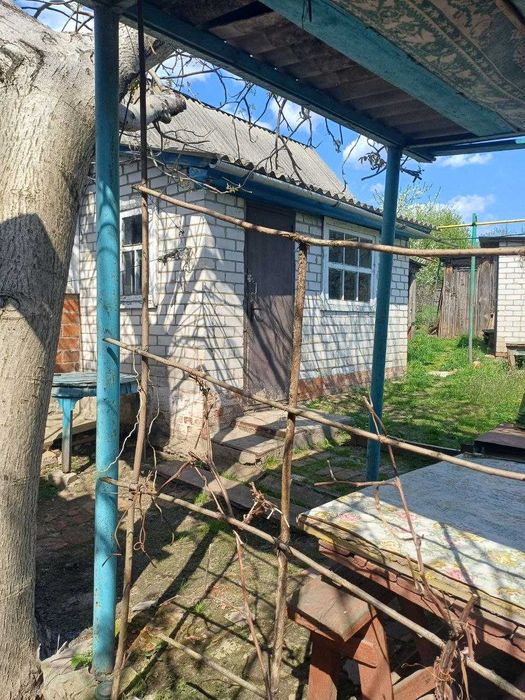 Продам 1/2 будинка в м.Богодухові