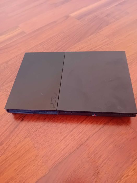 PlayStation2 com comando e microfones