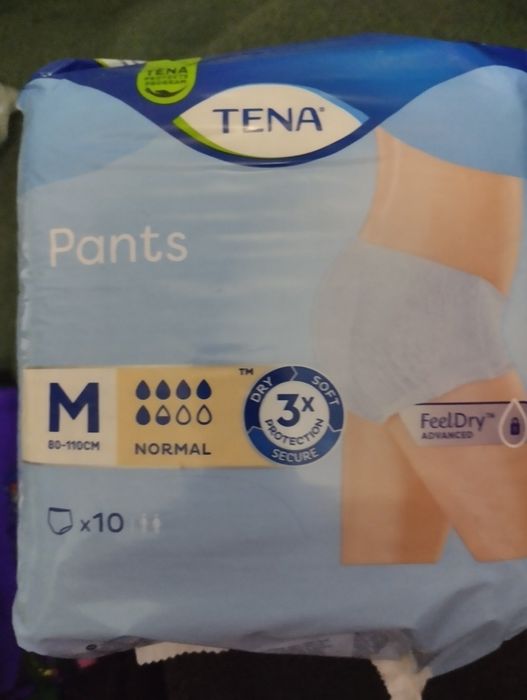 Підгузки памперсы Tena pants M +подарунок гра рибалка з вудочкою