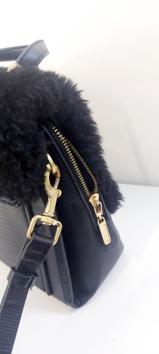 Mala mão ou tiracolo