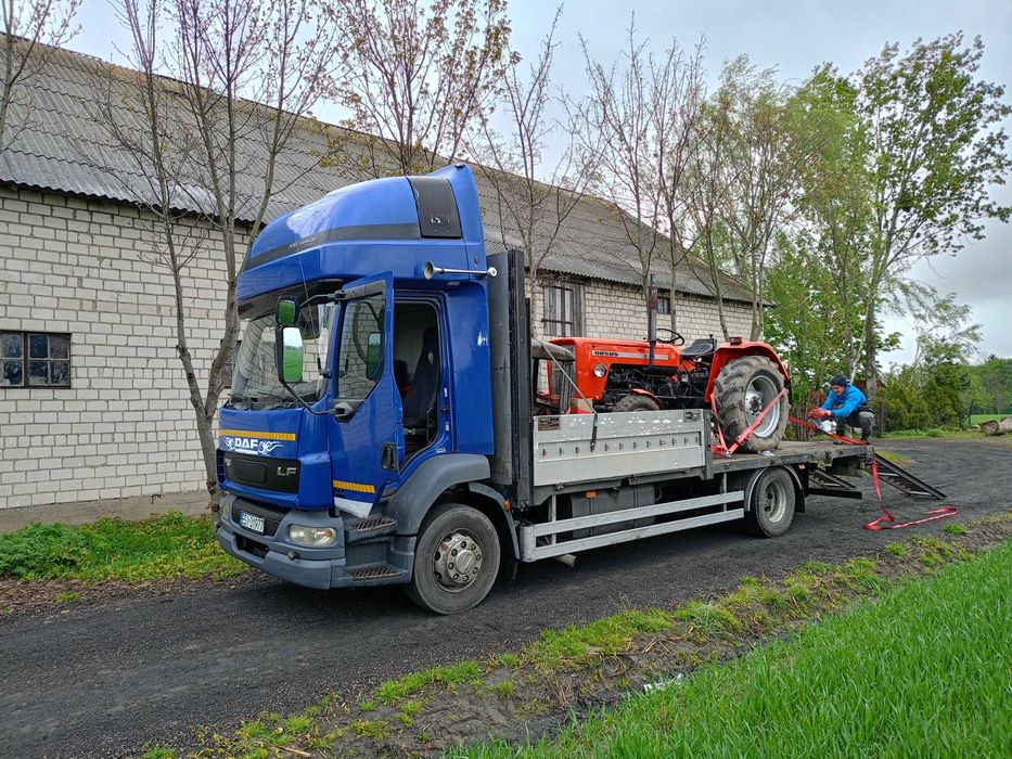 Transport maszyn rol pomoc drogowa usługi transportowe laweta do 8 ton