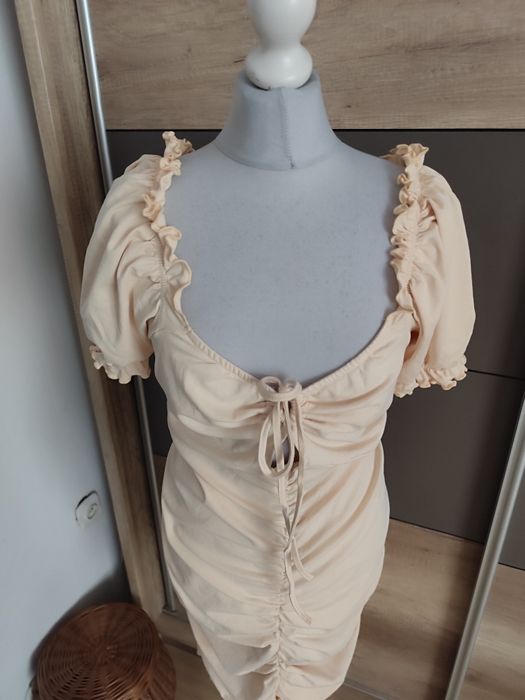 Beżowa dziewczęca sukienka r.48/50