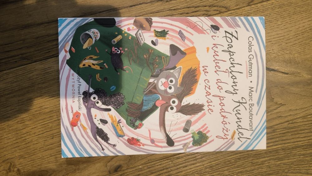 Zapchlony kundel i kubeł do podróży w czasie