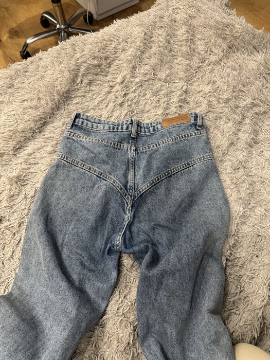 Джинси кокеткою кльош з розрізами