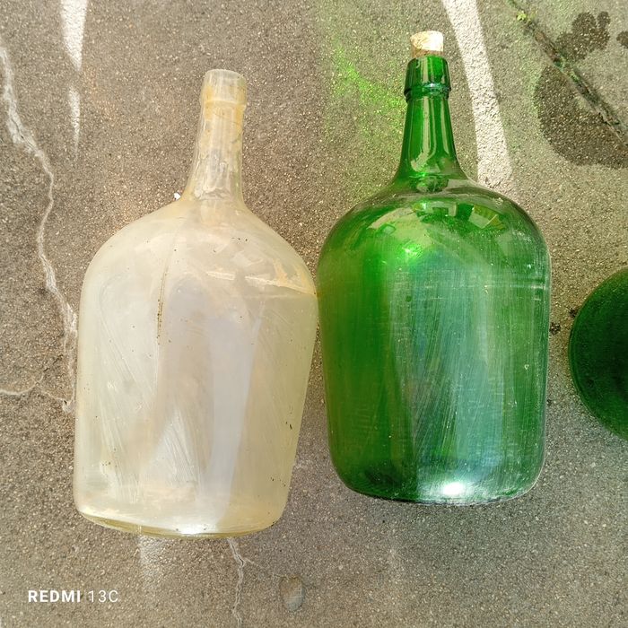 9 garrafões em vidro