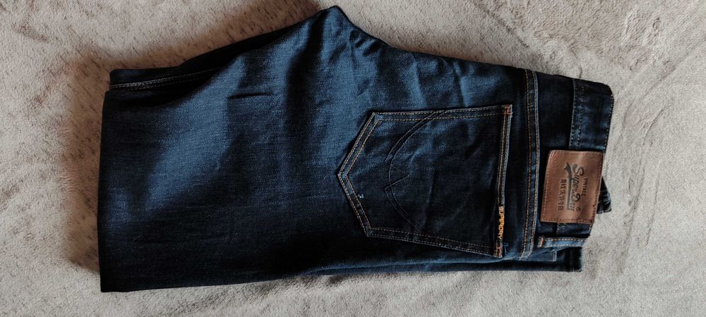 Super dry spodnie jeansy męskie