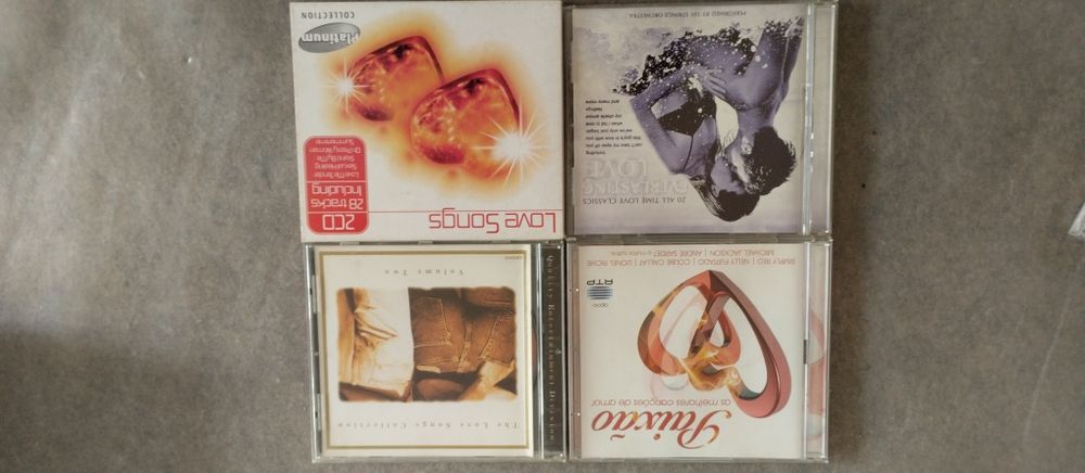 CDs musica romântica64552570571139122