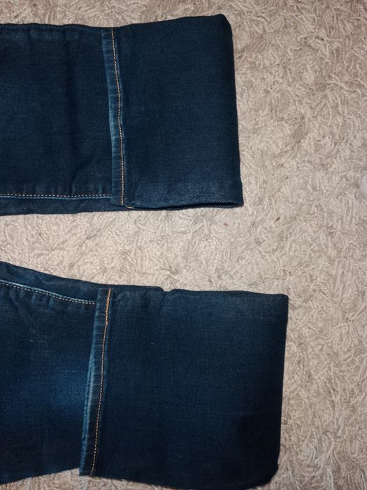 Jeansy, rozmiar 28, 712 slim ze stretchem firmy Levi's z dużym E