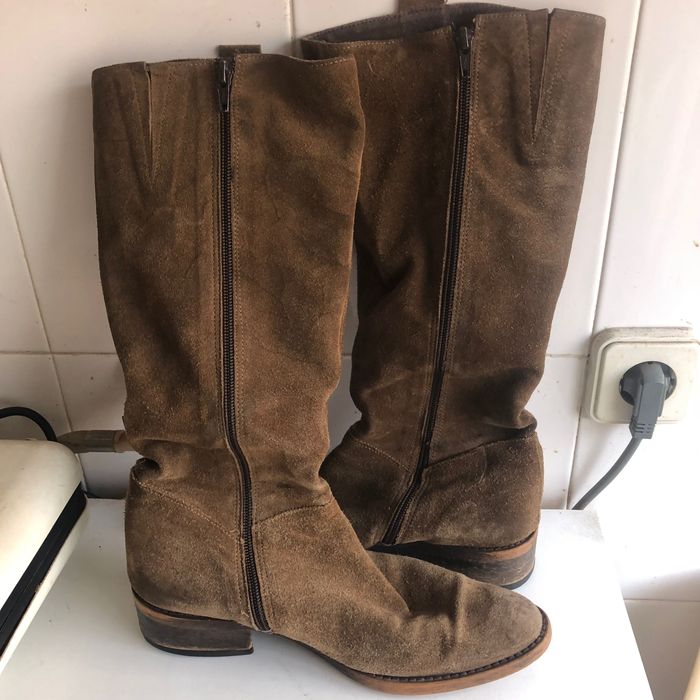 Botas em pele em bom estado