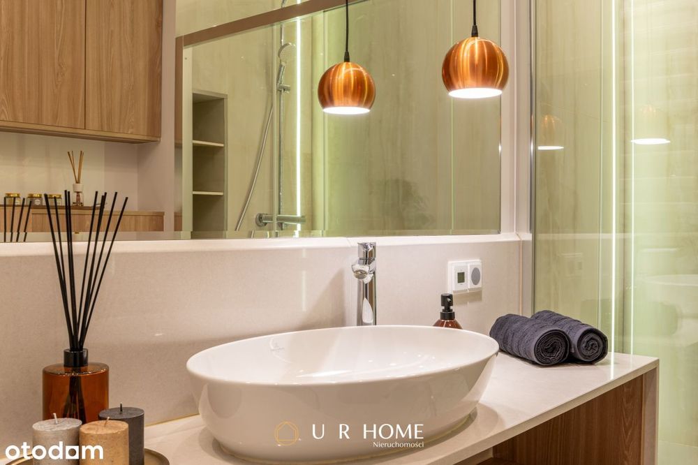 Elegancki apartament z garderobą, garażem i komórk