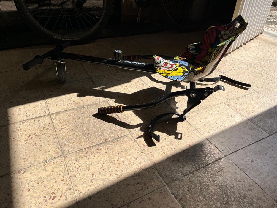 Vendo Hoverboard com kart.