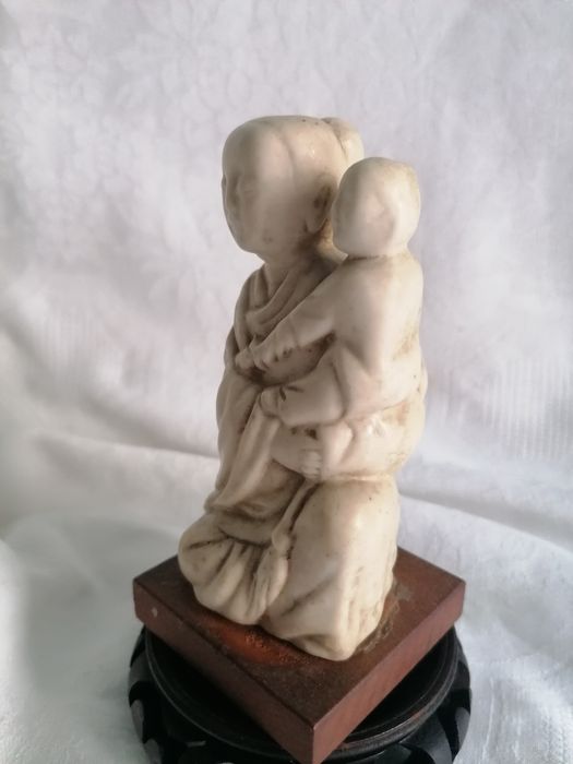 Estatua chinesa antiga pedra