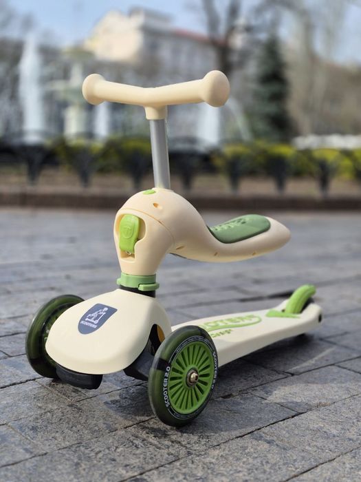 Стильний та модний самокат трансформер з батьківськой руч