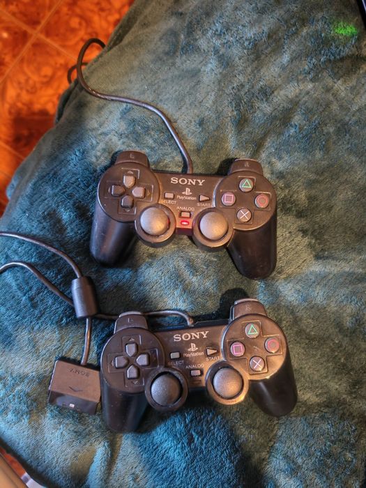 PS2 Slim + jogos + 2 comandos