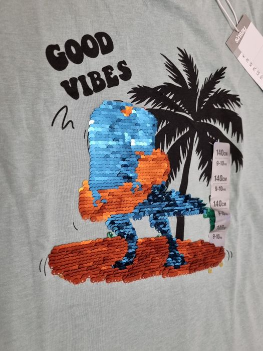 Футболка SinSay з двосторонніми пайєтками. Розмір 140.
Ши