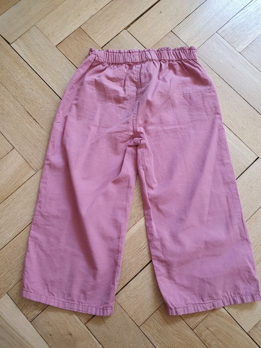 Szerokie spodnie dziewczęce Mango Kids MNG rozmiar 104 różowe