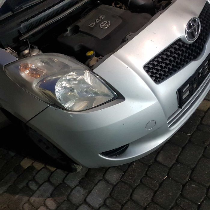 lampa reflektor toyota yaris II 2 08r P9 oryginał