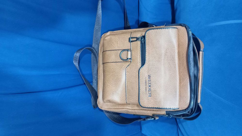 Mochila tira colo pele