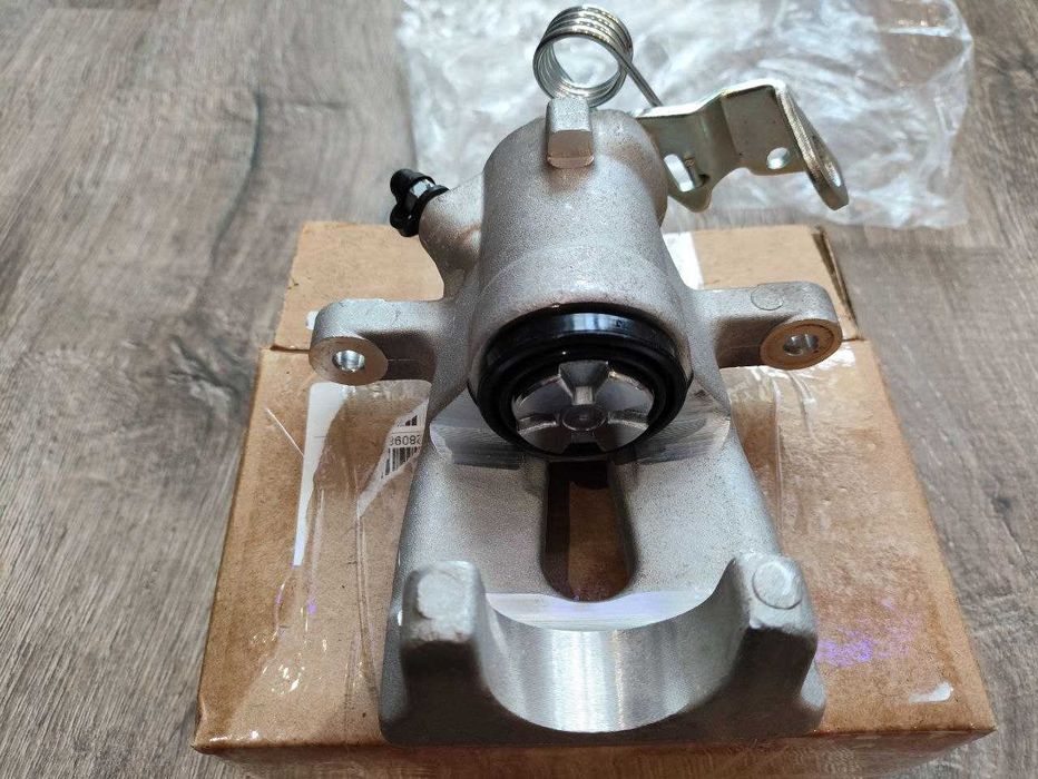 Супорт задній правий на Opel Astra