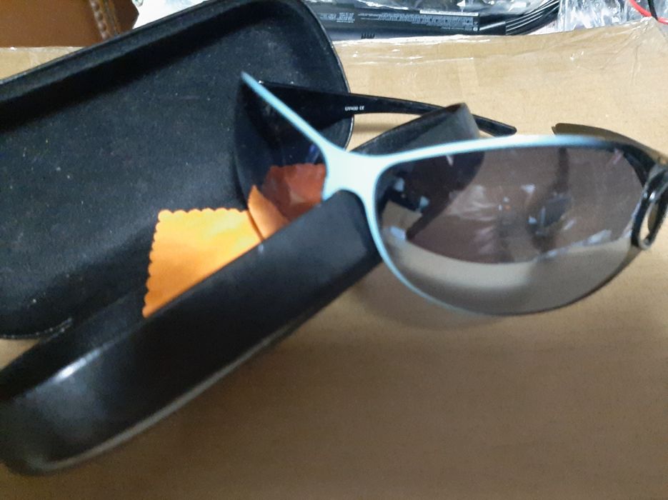 Oculos sol originais novos