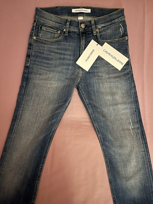 Wyprzedaż spodnie męskie Calvin Klein Jeans.
