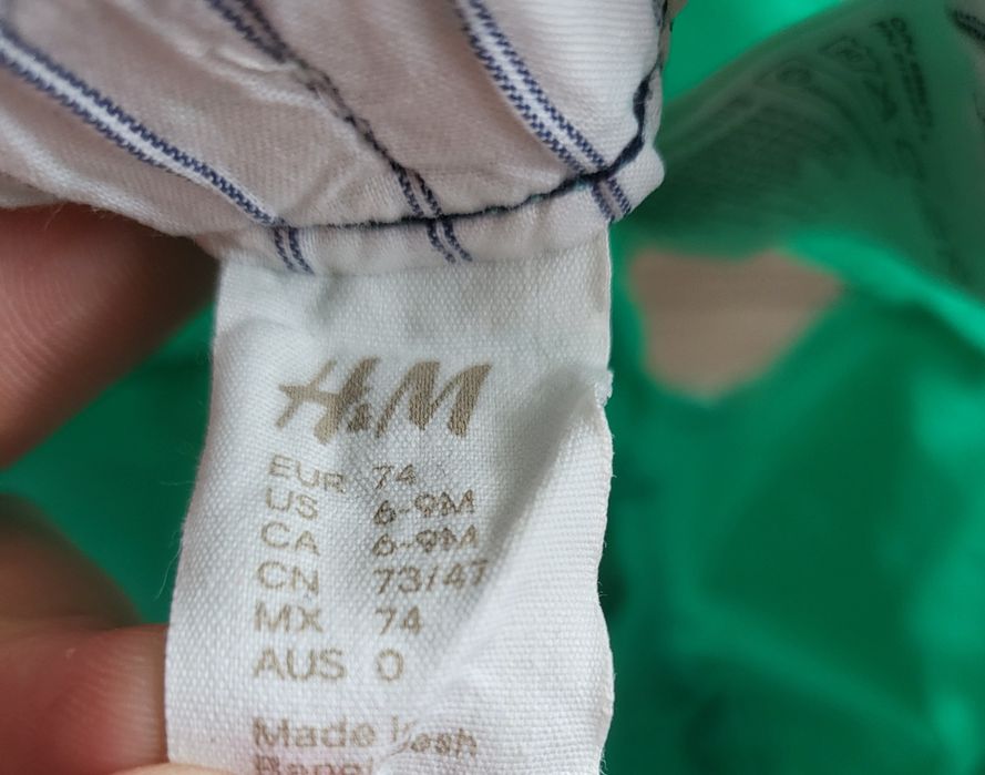Miętowe krótkie spodenki H&M rozm.74