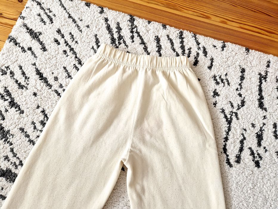 Kremowe spodnie Sinsay XS 34 spodenki dresy