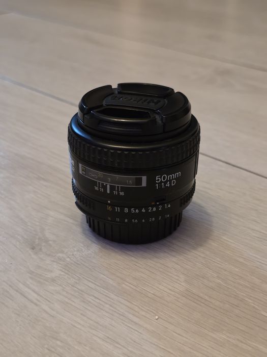 Комплект Nikon D7000 + об'єктиви + спалах і синхронізатор Godox в сумці.