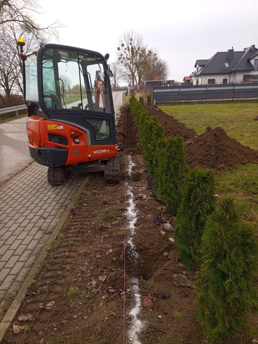 Usługi minikoparką koparko ładowarką odwodnienia  deszczówki szamba