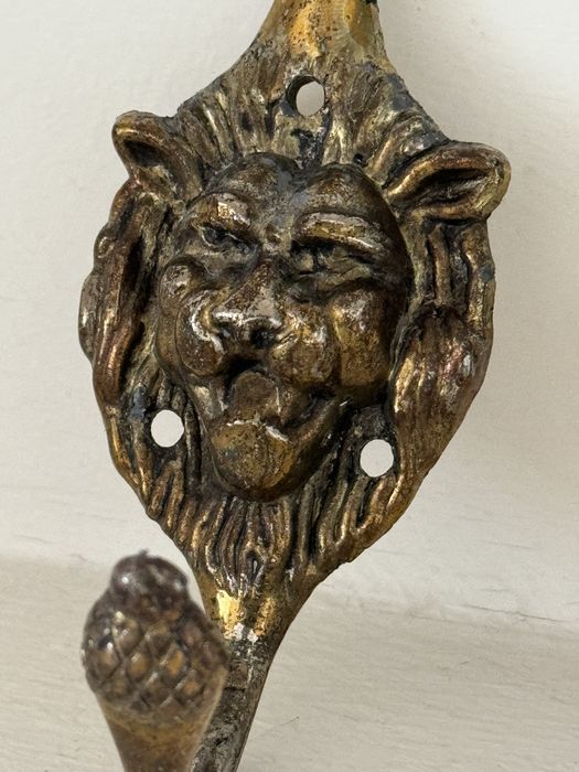 Cabide de parede dourado ( cabeca de leão) preço unitário