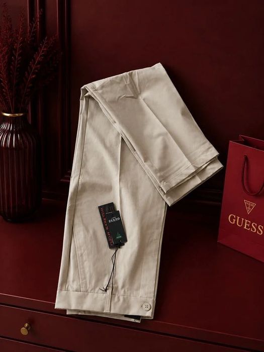 GUESS eleganckie beżowe spodnie z kantem