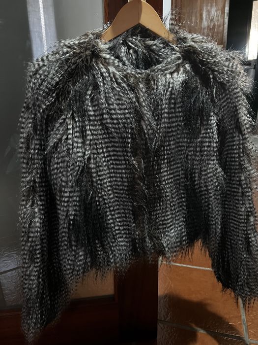 Casaco de pêlo castanho