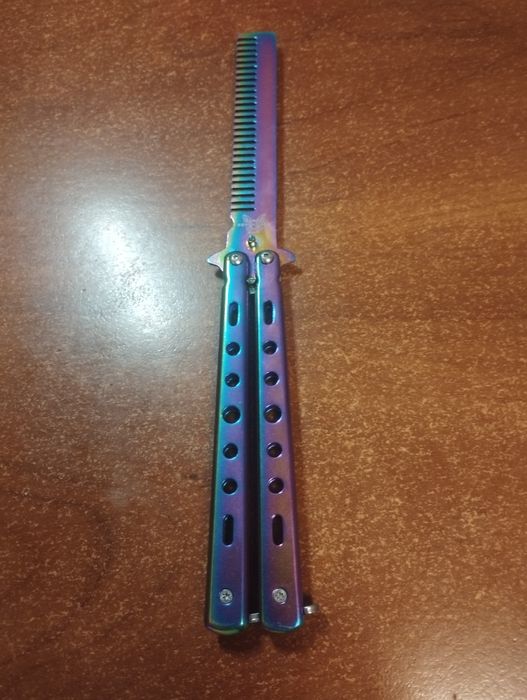 Ніж метелик (гребінець)